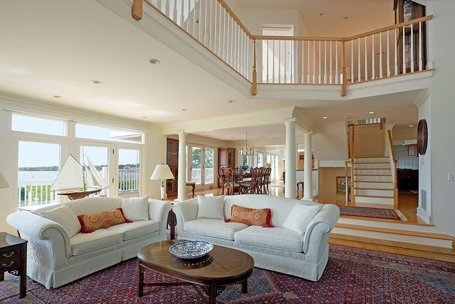 13 Pine Tree Drive Buzzards Bay, MA 02532 - Photo 8 of 30 a living room with furniture a fireplace and a table