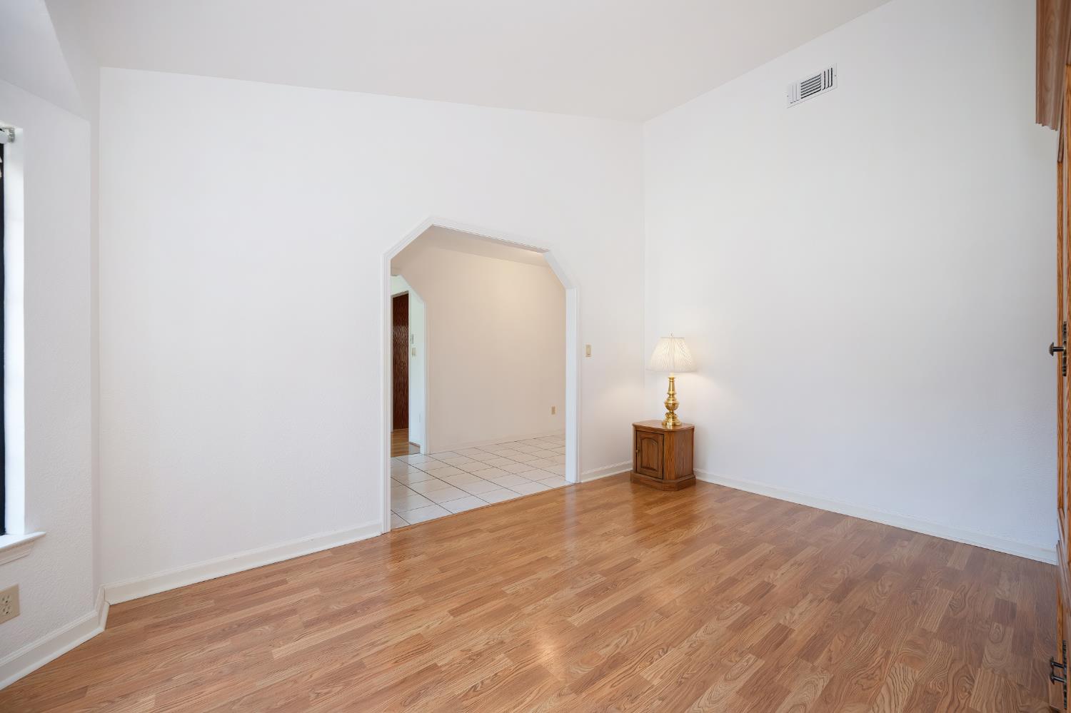 5408 East Brook Way Elk Grove, CA 95758 - Photo 14 of 53 a view of empty room with wooden floor