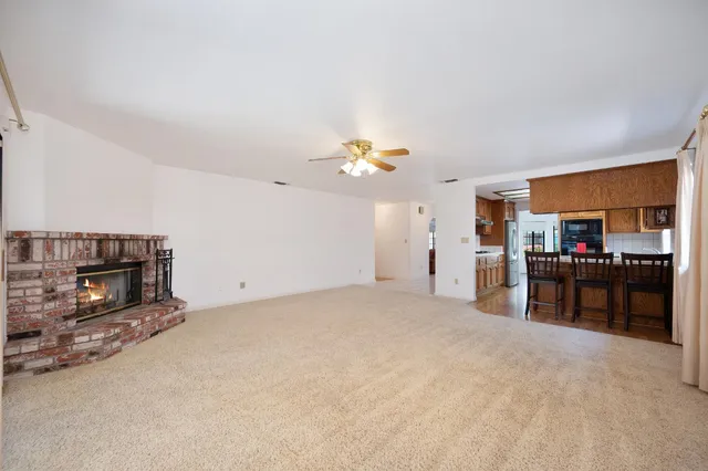 a view of a livingroom with natural light