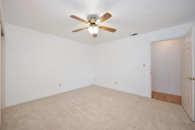 a bathroom with a double vanity sink mirror and