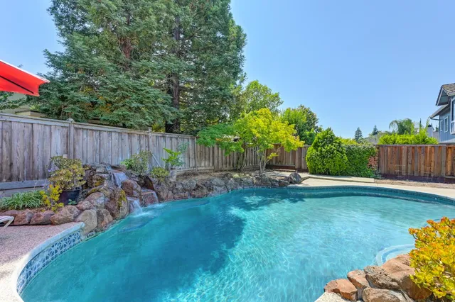 a view of a house with swimming pool