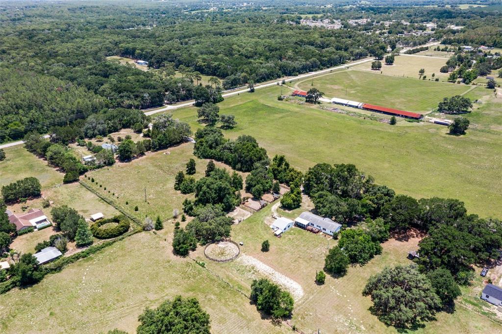26255 Lambeth Road Brooksville, FL 34601 - Photo 71 of 76 an aerial view of a house with a yard