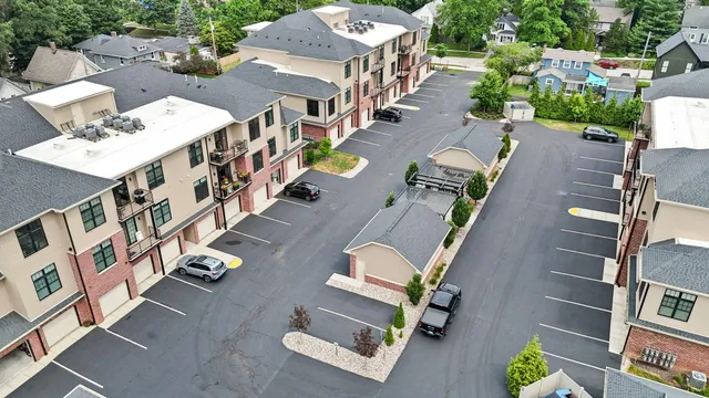 an aerial view of a house with a garden