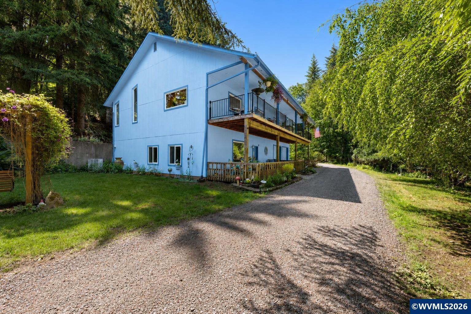 6100 Teal Creek Road Dallas, OR 97338 - Photo 2 of 41 a view of house with garden