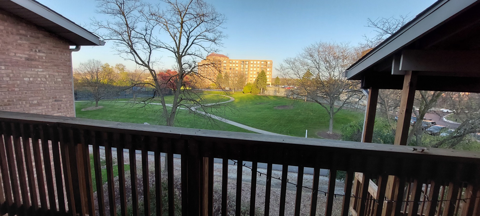 5854 Forest View Road, Unit E Lisle, IL 60532 - Photo 13 of 18 a view of a backyard with large trees
