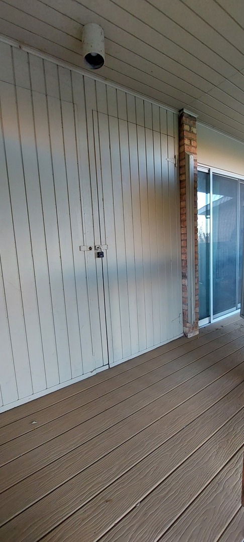5854 Forest View Road, Unit E Lisle, IL 60532 - Photo 15 of 18 a view of wooden floor