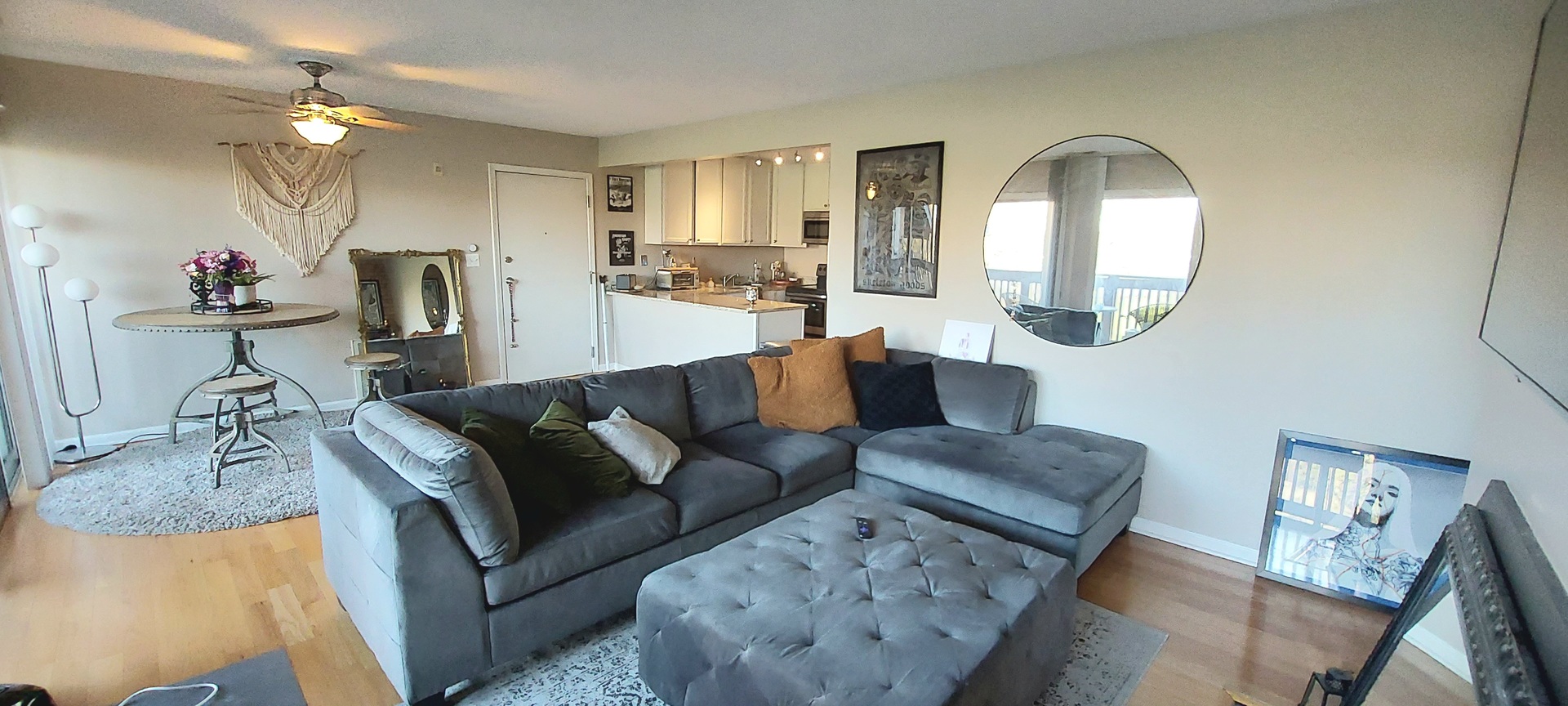 5854 Forest View Road, Unit E Lisle, IL 60532 - Photo 3 of 18 a living room with furniture and a mirror