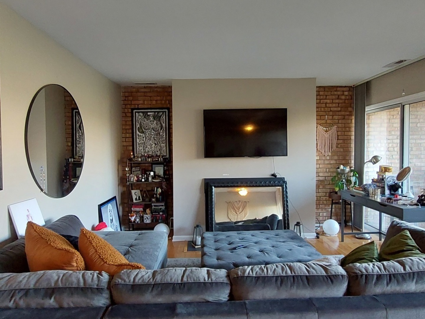 5854 Forest View Road, Unit E Lisle, IL 60532 - Photo 6 of 18 a living room with furniture and a flat screen tv