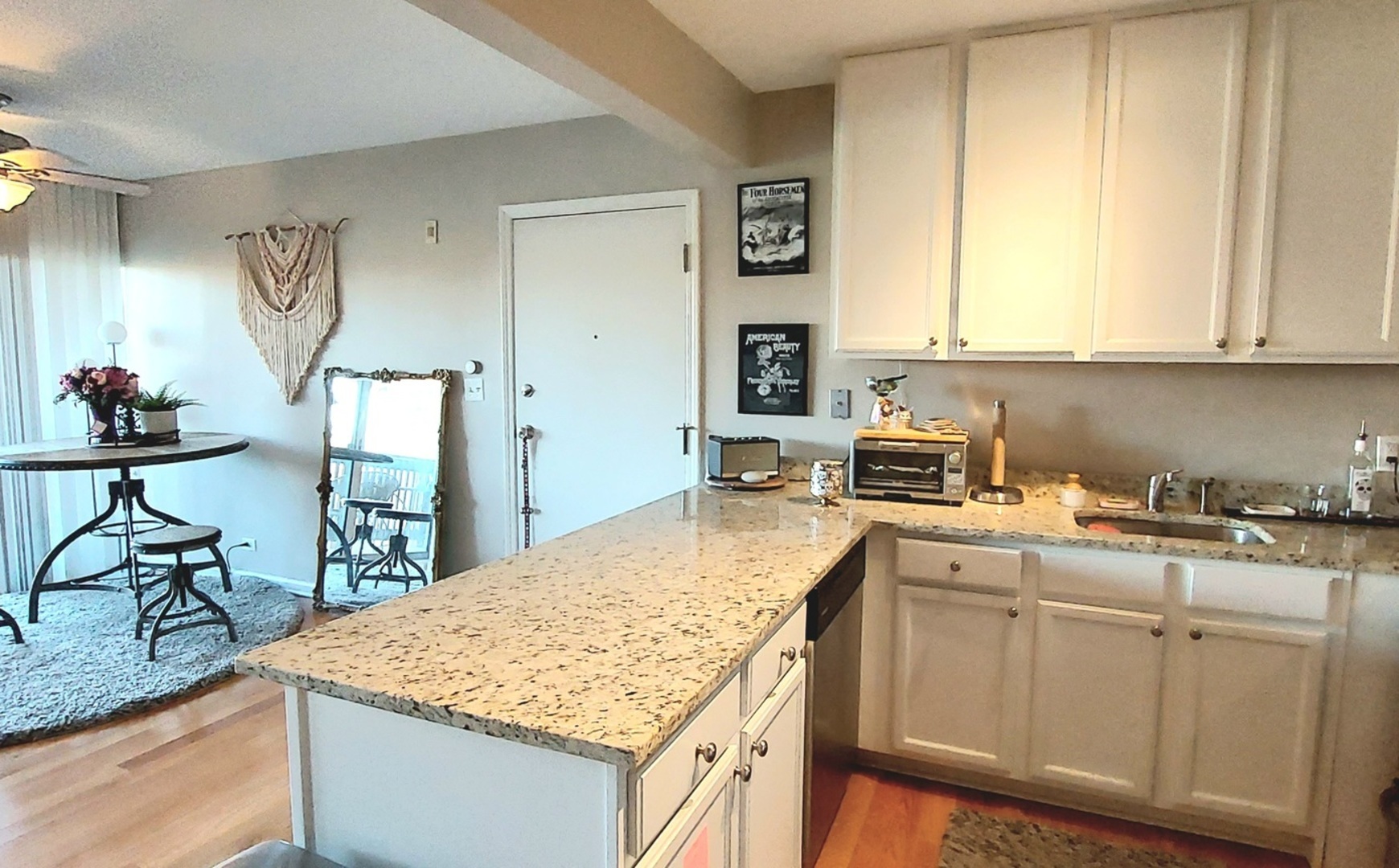 5854 Forest View Road, Unit E Lisle, IL 60532 - Photo 10 of 18 a kitchen with a sink stove and cabinets