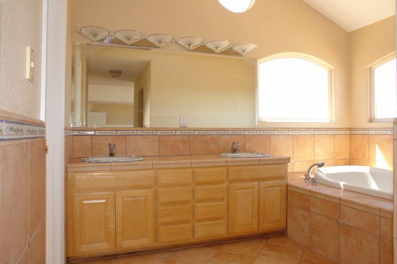 4450 Quimby Road San Jose, CA 95148 - Photo 17 of 19 view of a bathroom with a sink and a window