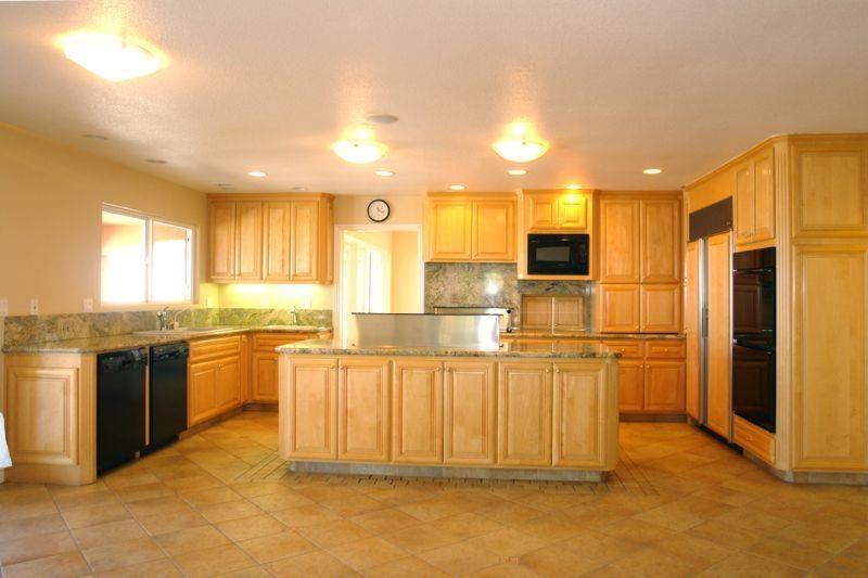 4450 Quimby Road San Jose, CA 95148 - Photo 7 of 19 a large kitchen with stainless steel appliances granite countertop a stove a sink and a refrigerator