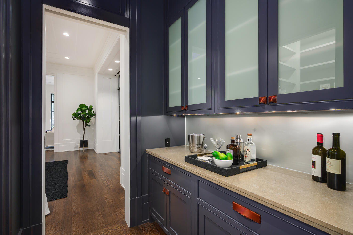 2026 North Mohawk Street Chicago, IL 60614 - Photo 18 of 56 a kitchen with a sink a potted plant and cabinets
