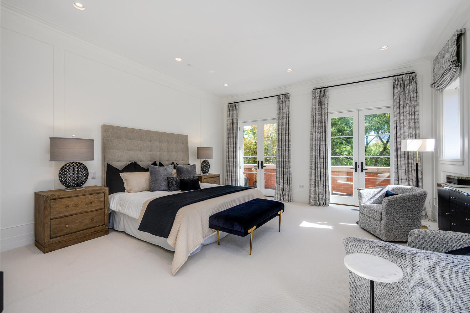 2026 North Mohawk Street Chicago, IL 60614 - Photo 21 of 56 a spacious bedroom with a bed and glass window