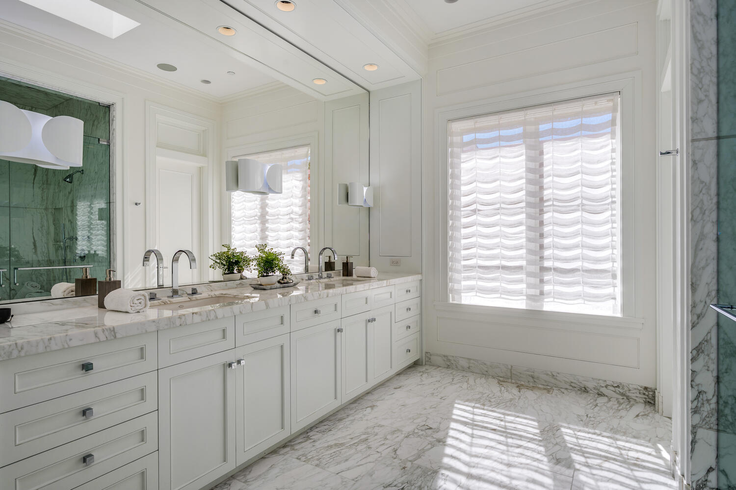 2026 North Mohawk Street Chicago, IL 60614 - Photo 26 of 56 a bathroom with a granite countertop sink mirror and a window