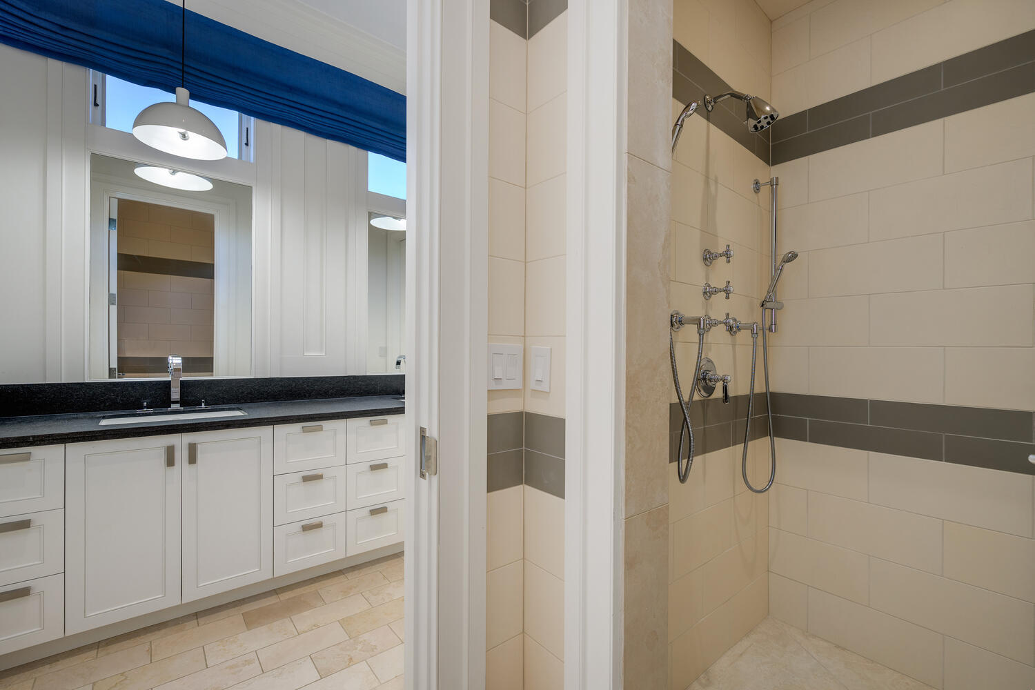 2026 North Mohawk Street Chicago, IL 60614 - Photo 35 of 56 a bathroom with a sink and a mirror