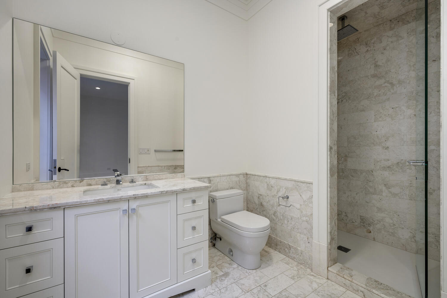 2026 North Mohawk Street Chicago, IL 60614 - Photo 38 of 56 a bathroom with a granite countertop sink toilet and shower