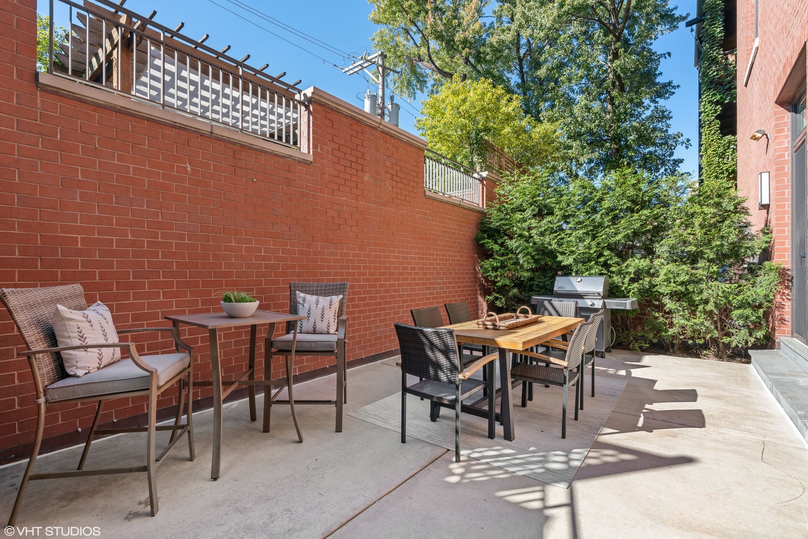 2026 North Mohawk Street Chicago, IL 60614 - Photo 54 of 56 a view of a patio with table and chairs and potted plants