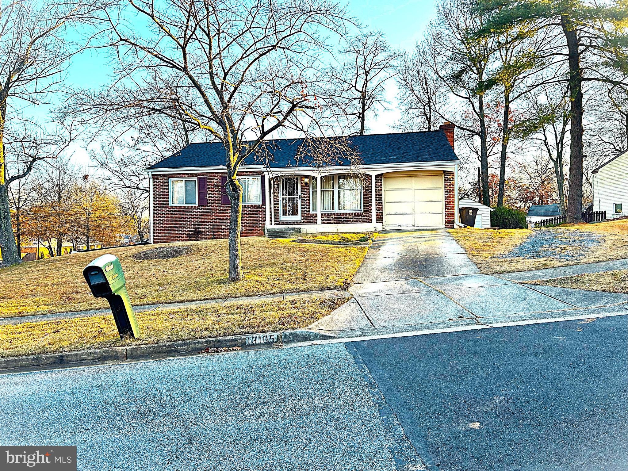 13105 Imperial Court Laurel, MD 20708 - Photo 2 of 13 a view of a house with a big yard and large tree