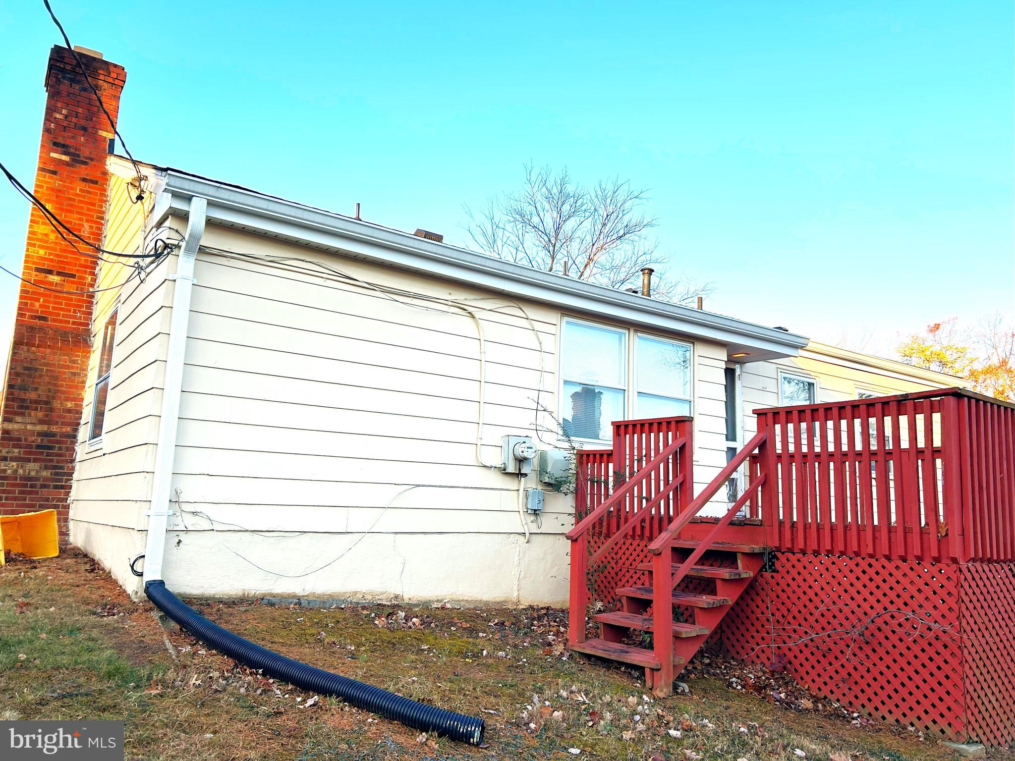 13105 Imperial Court Laurel, MD 20708 - Photo 5 of 13 a view of a roof deck with a chair