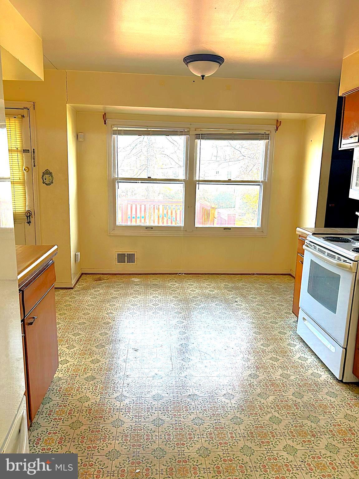 13105 Imperial Court Laurel, MD 20708 - Photo 8 of 13 a view of an empty room with a window