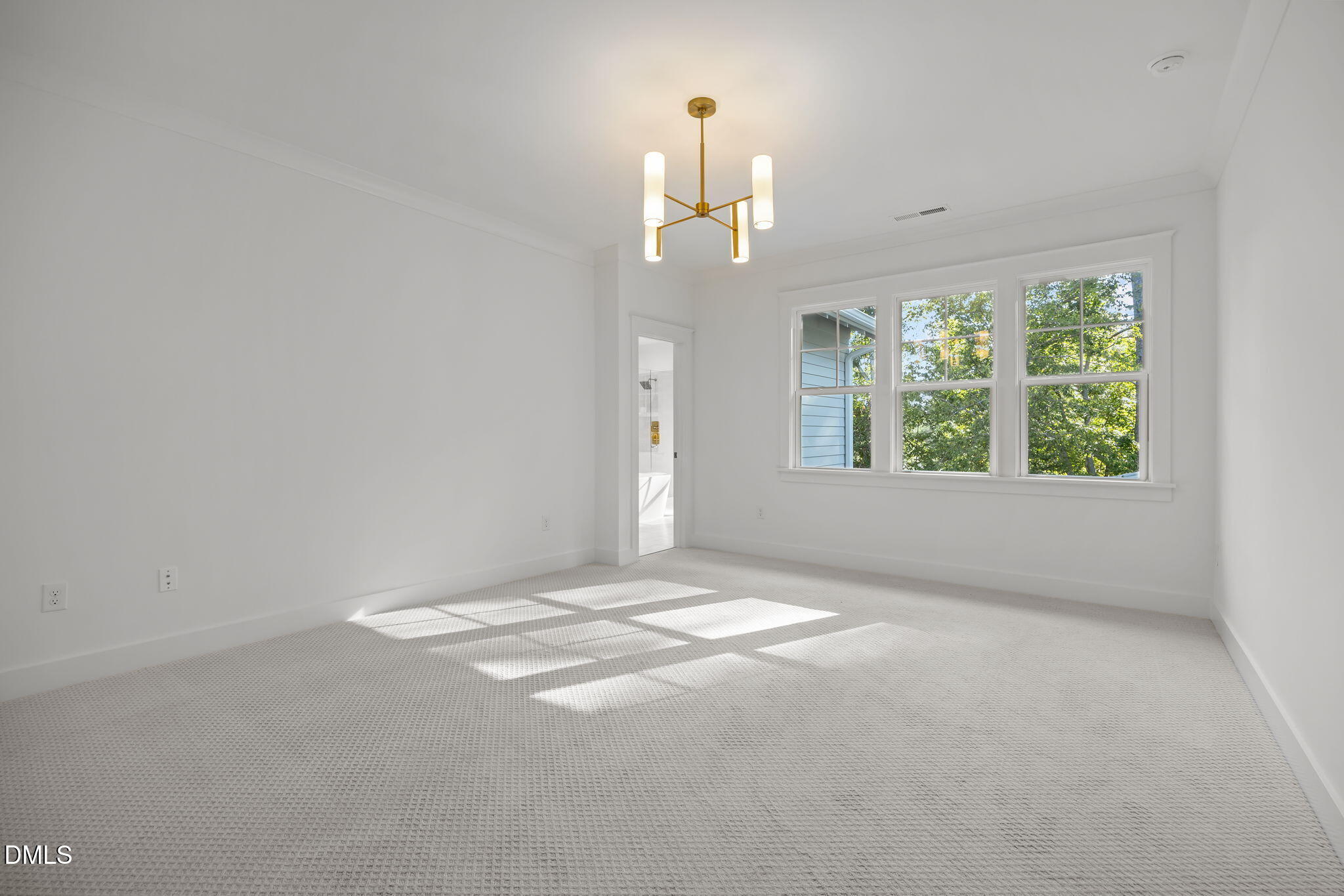 1701 Burnette Gdn Path Raleigh, NC 27612 - Photo 16 of 49 a view of an empty room with a window