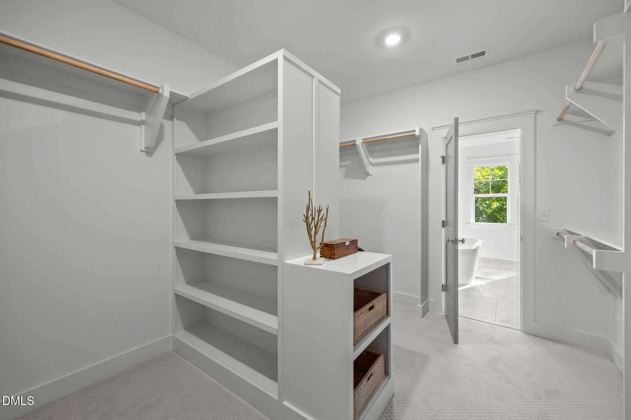 1701 Burnette Gdn Path Raleigh, NC 27612 - Photo 22 of 49 a view of an empty walk in closet