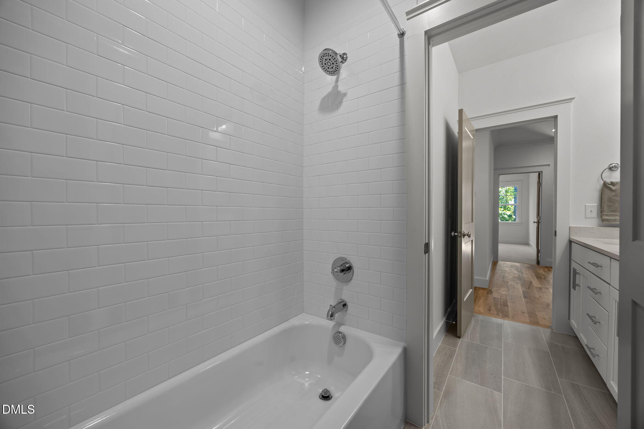 1701 Burnette Gdn Path Raleigh, NC 27612 - Photo 30 of 49 a bathroom with a bathtub