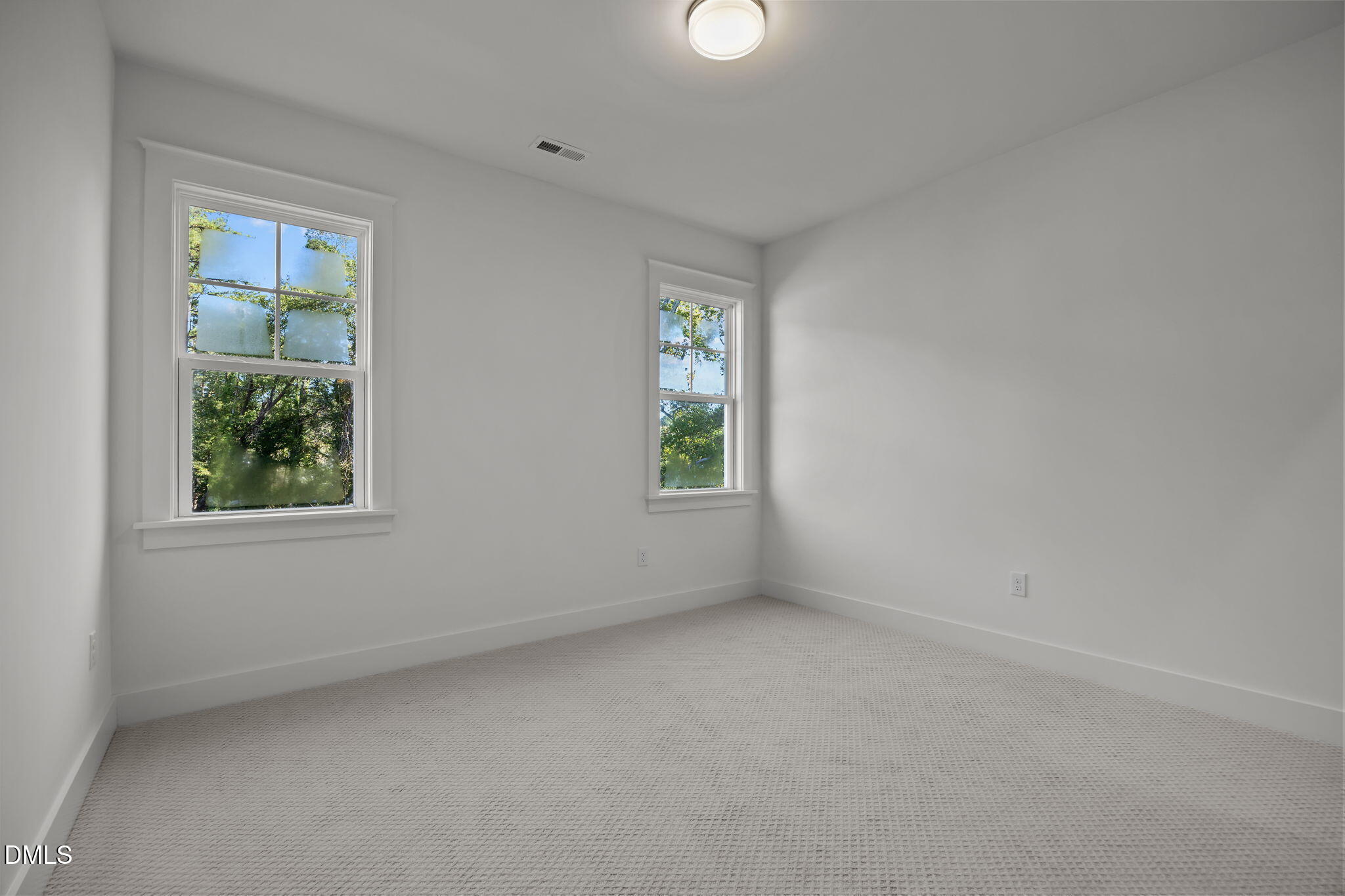 1701 Burnette Gdn Path Raleigh, NC 27612 - Photo 32 of 49 an empty room with windows