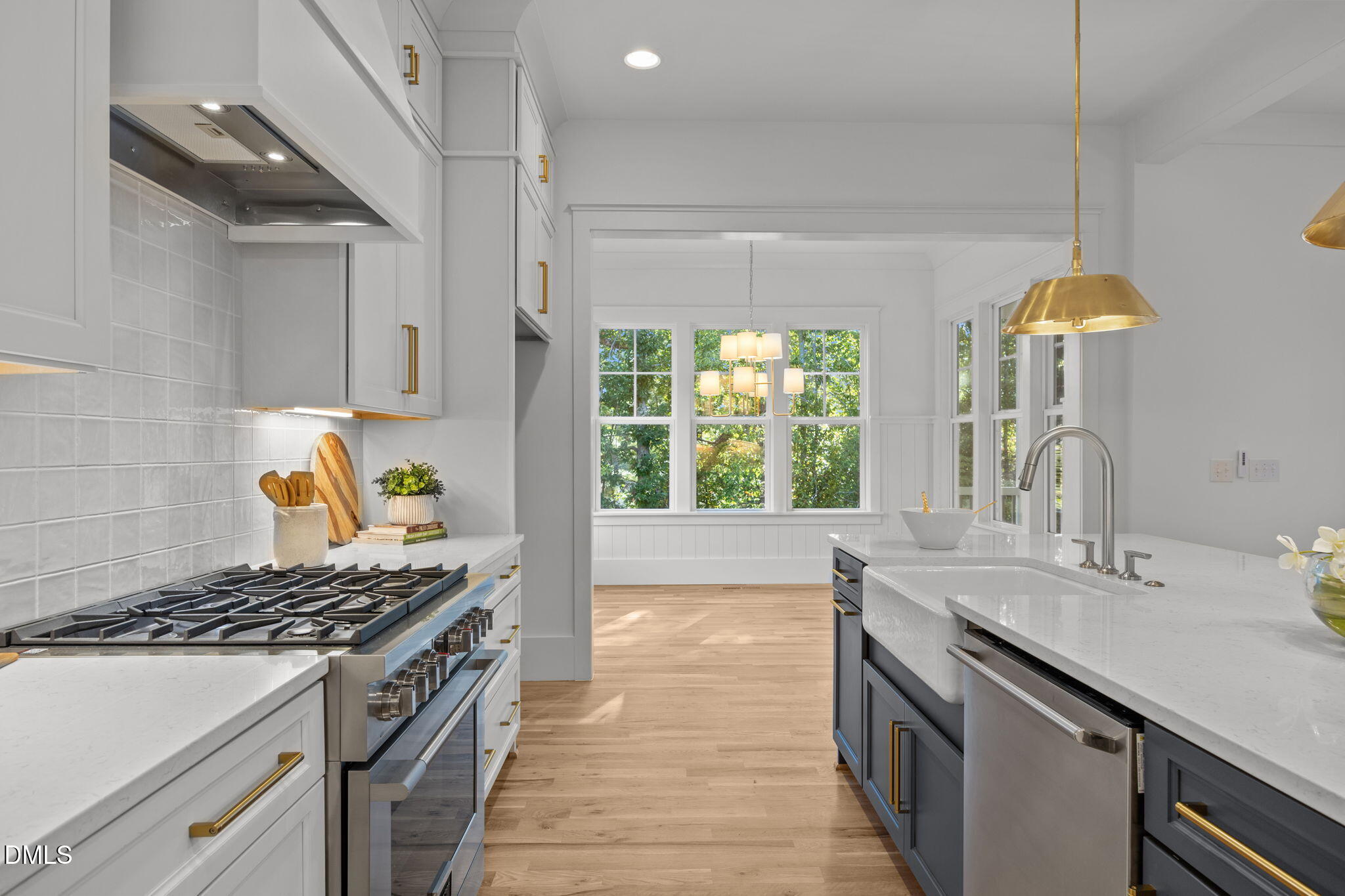 1701 Burnette Gdn Path Raleigh, NC 27612 - Photo 9 of 49 a kitchen with a stove and a sink