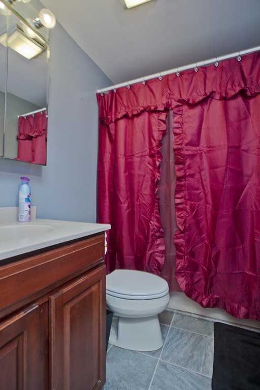 18 Stafford Road Holland, MA 01521 - Photo 8 of 16 a bathroom with a toilet a sink and curtain