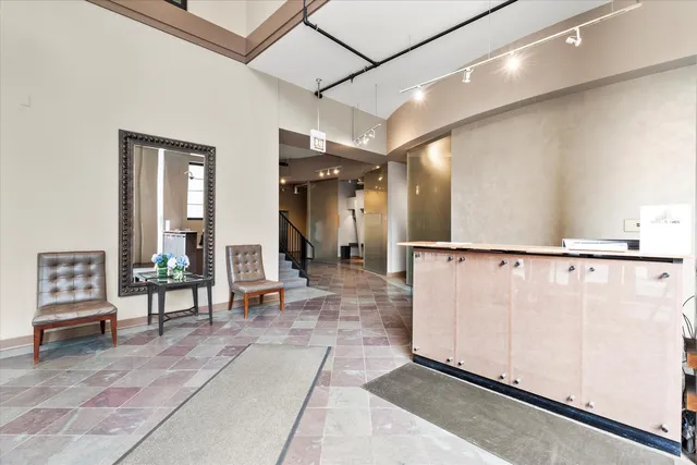 a view of a hallway with living room