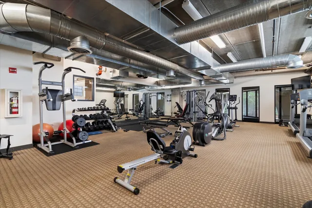a view of a room with gym equipment