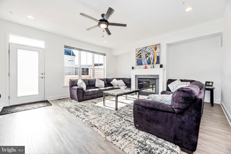 952 Holden Road Frederick, MD 21701 - Photo 11 of 20 a living room with furniture and a fireplace