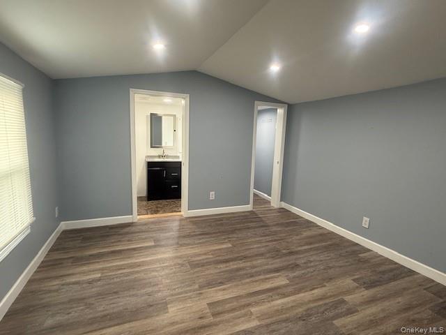 567 Sheafe Road, Unit 10 Wappingers Falls, NY 12590 - Photo 11 of 21 an empty room with wooden floor and windows