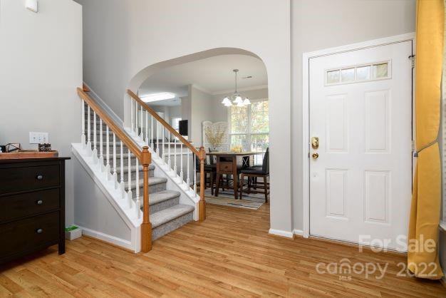 903 Azurine Circle Fort Mill, SC 29708 - Photo 3 of 19 a view of entryway and hall with wooden floor