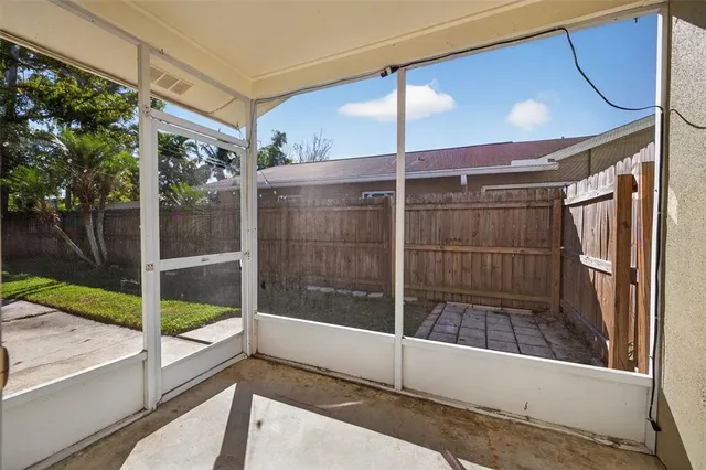 a bathroom with a tub and shower