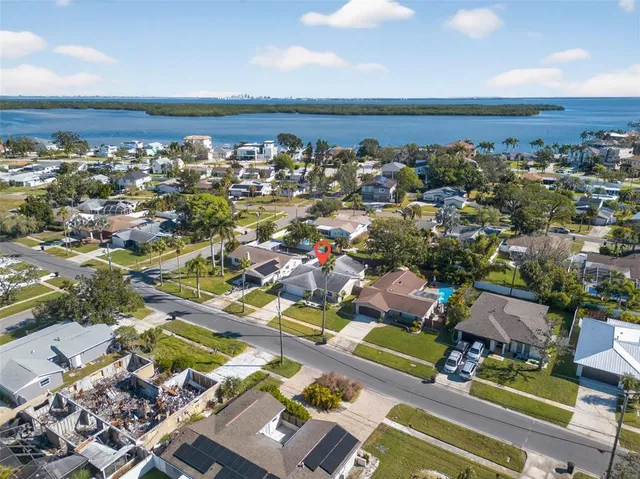 an aerial view of residential building and ocean