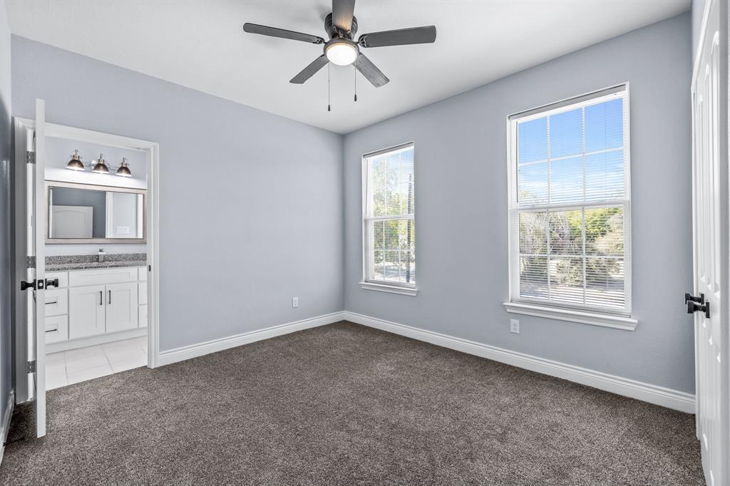 1701 Belzise Terrace Fort Worth, TX 76104 - Photo 13 of 35 a view of a livingroom with a flat screen tv