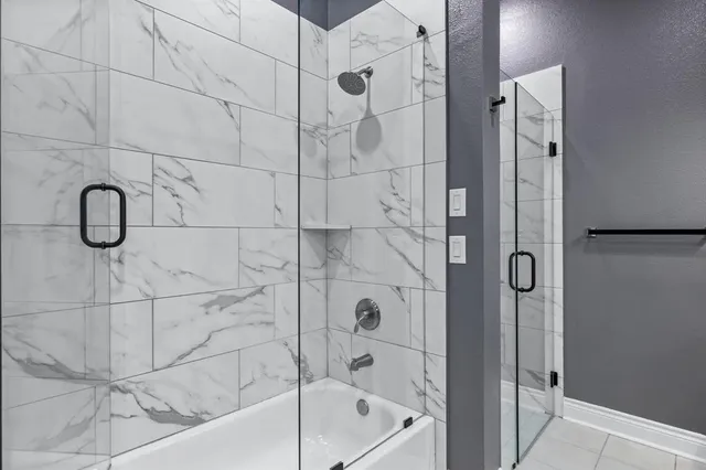 a bathroom with a bath tub