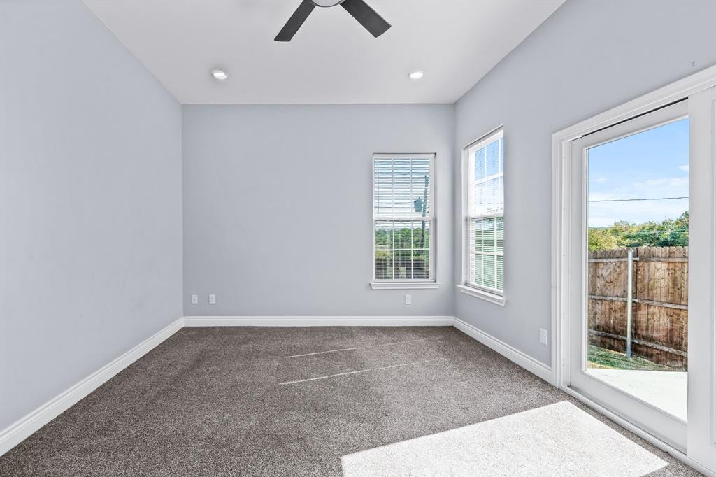 1701 Belzise Terrace Fort Worth, TX 76104 - Photo 23 of 35 an empty room with windows