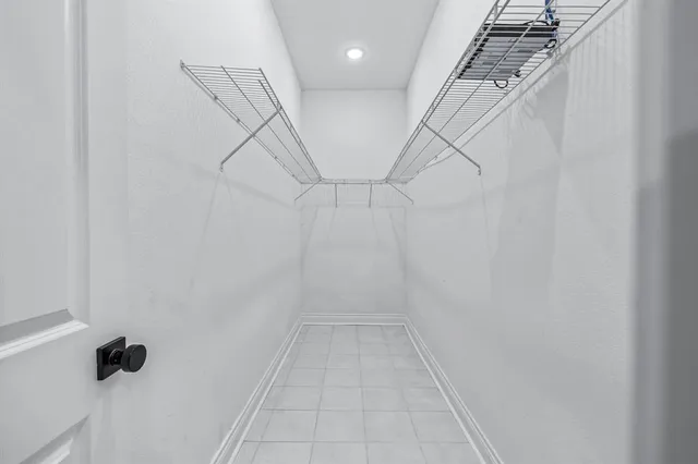 a view of a room with racks on the wall