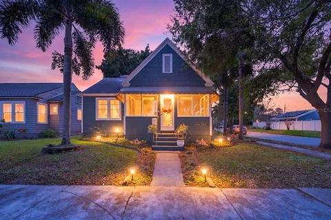 a view of a house with swimming pool
