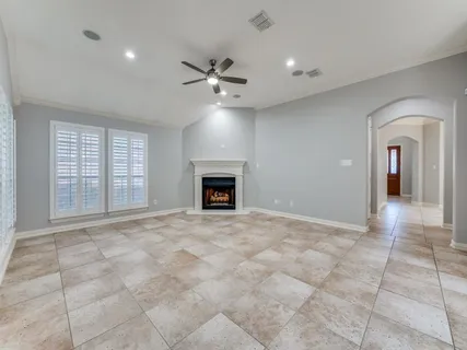 a view of a kitchen with a sink and microwave