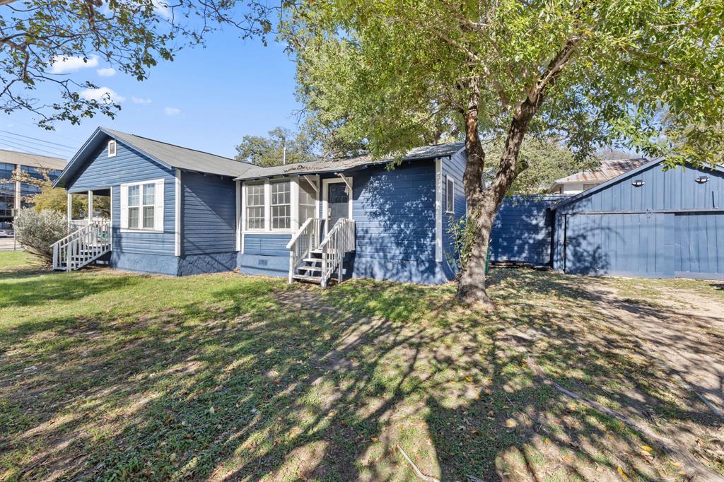 1202 East 29th Street, Unit A Austin, TX 78722 - Photo 1 of 22 View of front of property featuring a front lawn, entry steps, and crawl space