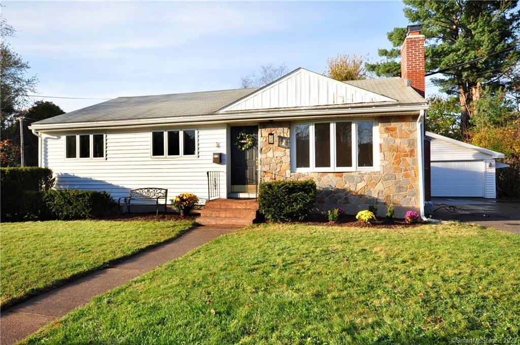 5 Lawton Road Manchester, CT 06042 - Photo 1 of 1 a front view of a house with a yard