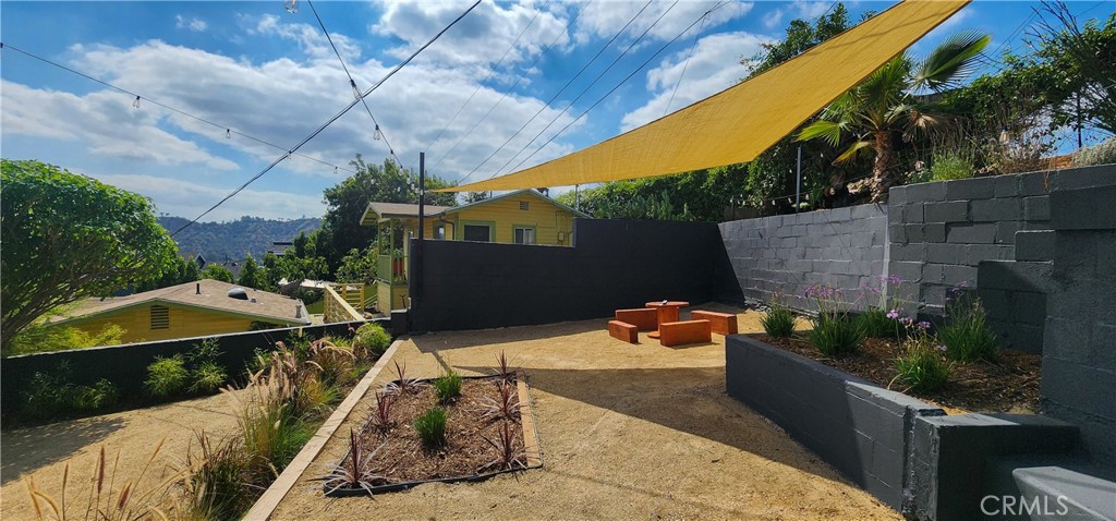 3015 Future Street Los Angeles, CA 90065 - Photo 4 of 22 a backyard of a house with seating space