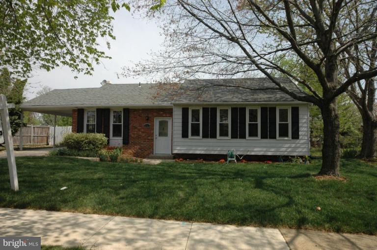 a view of a house with a garden