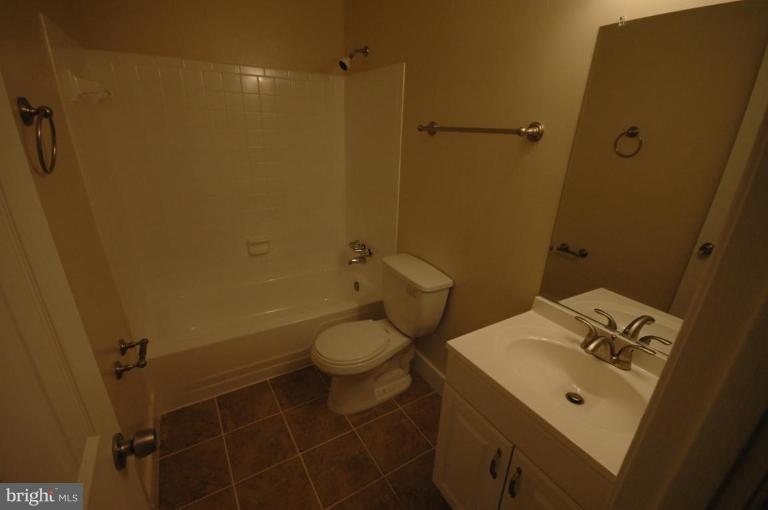 3761 Stonesboro Road Fort Washington, MD 20744 - Photo 12 of 30 a bathroom with a sink toilet and shower