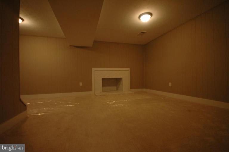 3761 Stonesboro Road Fort Washington, MD 20744 - Photo 14 of 30 a view of an empty room with a fireplace