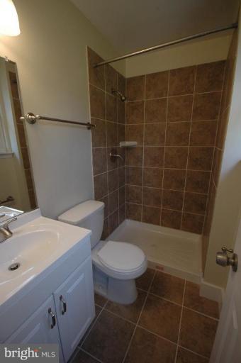 3761 Stonesboro Road Fort Washington, MD 20744 - Photo 21 of 30 a bathroom with a sink toilet and shower